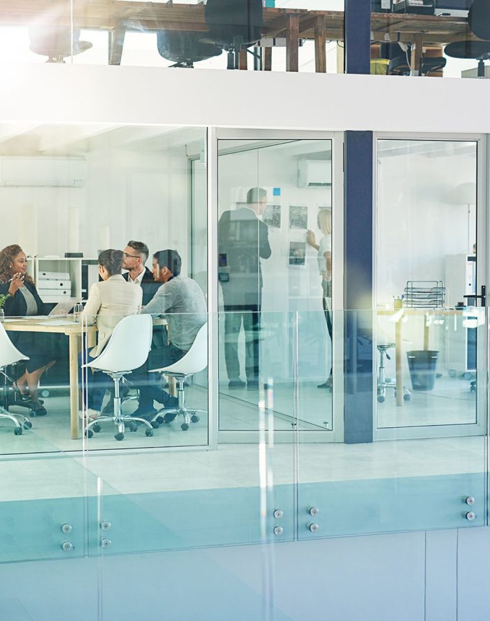 Success is the product of teamwork. Shot of corporate colleagues working together in their office.; Shutterstock ID 2167990401; purchase_order: -; job: -; client: -; other: -